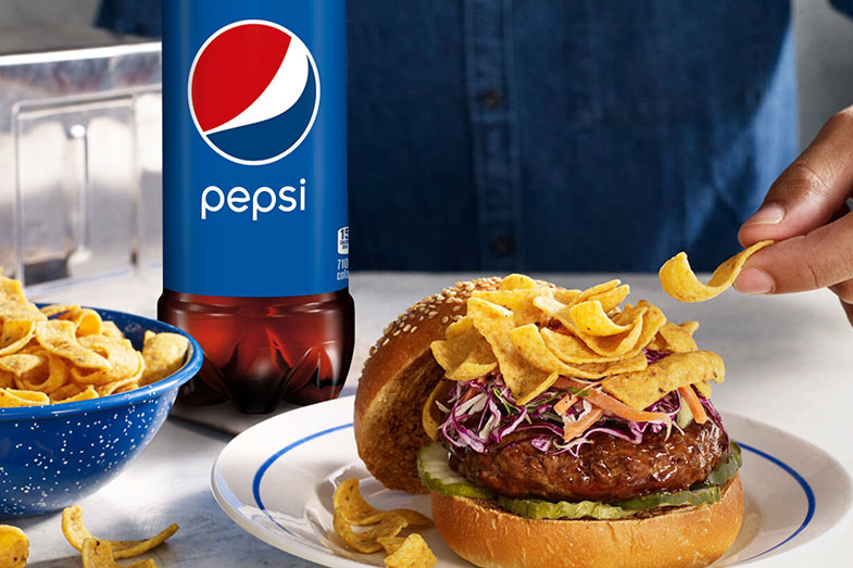 Deep South BBQ Burger made with FRITOS® Corn Chips Image Of Deep South BBQ Burger made with FRITOS® Corn Chips SKU: